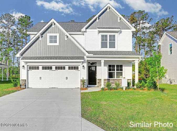3024 Goldenaster Ct Leland, NC in Grayson Park. Located on a oversized cul-de-sac lot, is the Sea Breeze, currently under construction by Hardison... Photo 1