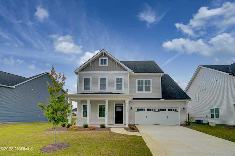 Real Estate & property in Hampstead NC at 205 W Yellow Lois Dr the latest price of $509,650 in Zipcode 28443 Photo 1