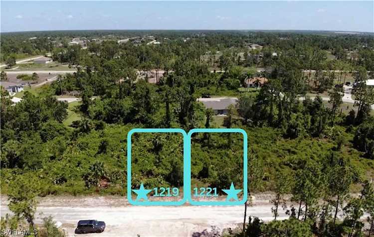 1219 E Ecstasy St in FL, Lehigh Acres Photo 1