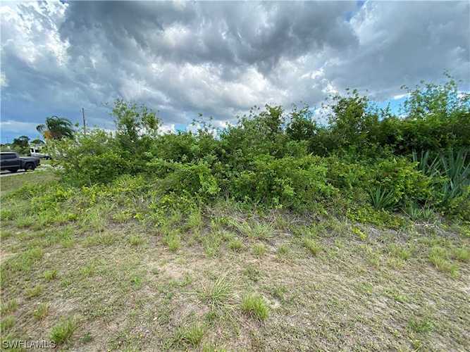 703 N Bert Ave in FL, Lehigh Acres Photo 1