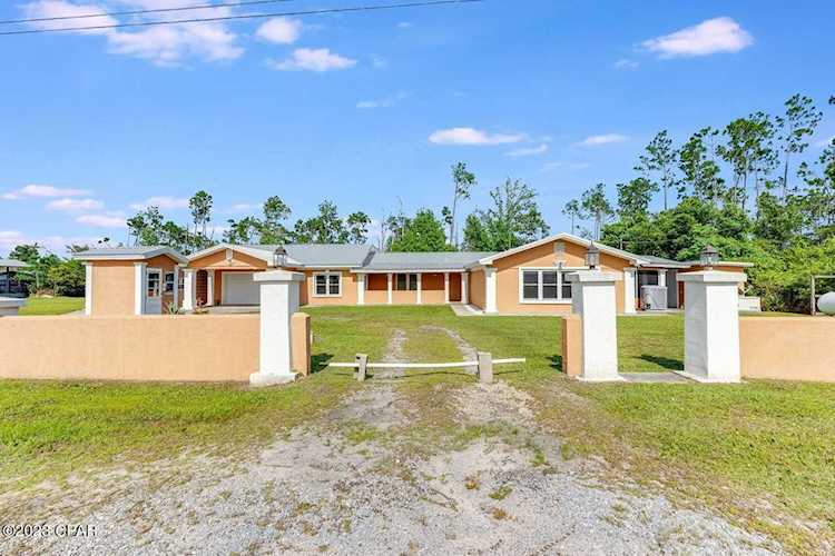 5302 Whitney Dr Panama City FL 32404 742427 Rolling Hills home for sale If you are looking for a home with space, privacy, a well and generator, this house has it all.... Photo 1