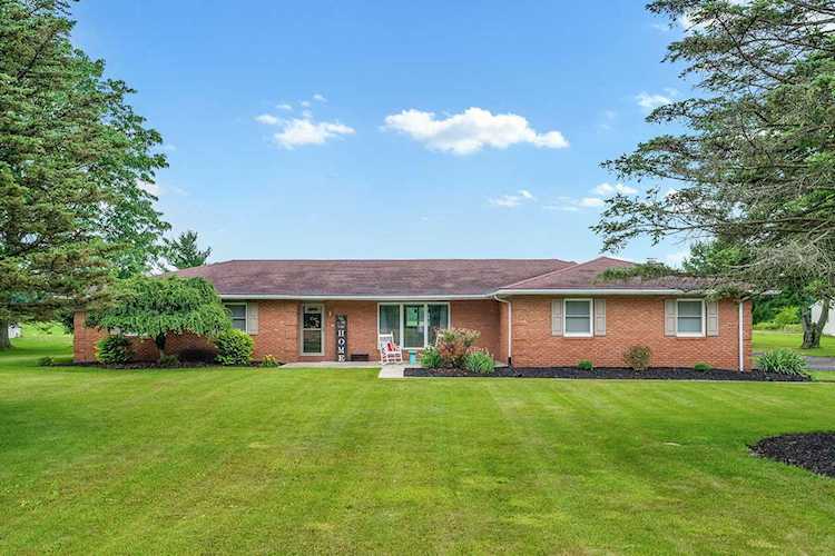 For Sale: $352,000 A home for sale for sale at 721 Somerlot Hoffman Road Marion, OH 43302 - Marion. MLS 223019904 - This single-story brick home boasts 1,832 sqft of living space in Pleasant Local School District.... Photo 1