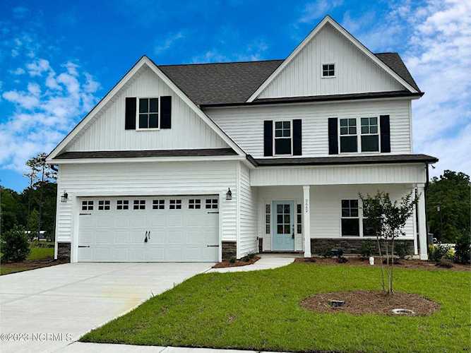 2662 Longleaf Pine Circle Leland, NC in Grayson Park. Move-in today! The Cedar from American Homesmith offers plenty of room for all, with 4 bedrooms and... Photo 1
