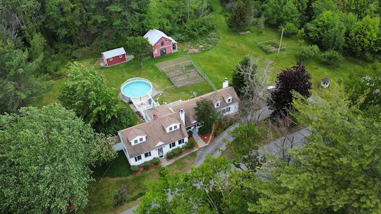 247 East Dunbarton Rd in Goffstown, NH - Century 21 New England Photo 1