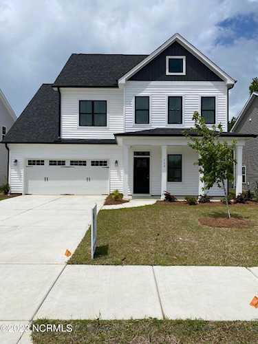 Real Estate & property in Hampstead NC at 119 S Wild Indigo Place the latest price of $509,650 in Zipcode 28443 Photo 1
