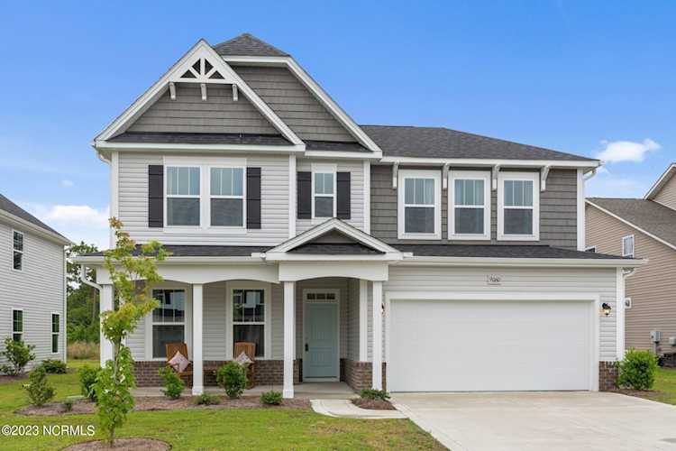 9060 Gardens Grove Rd Leland, NC in Grayson Park. Stunning 4 BR/2.5 bath model home is ready for you in Grayson Park in Leland! Beautiful, coffered... Photo 1