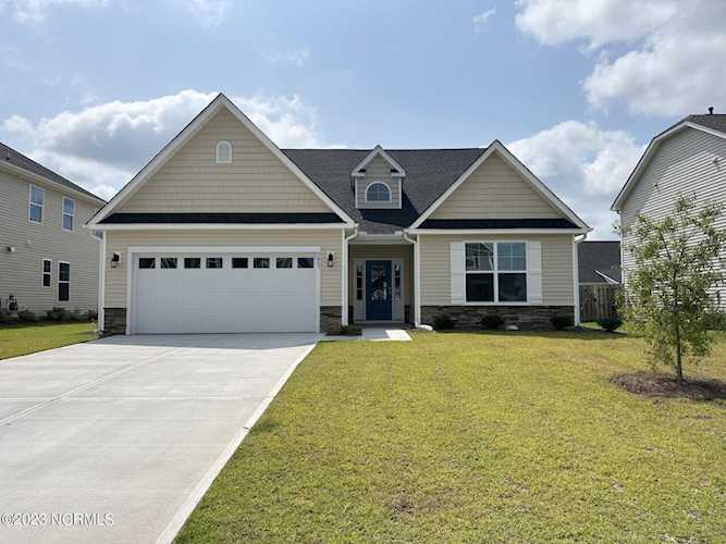 2857 Longleaf Pine Circle Leland, NC in Grayson Park. The Cotswold III (E) plan by Windsor Homes builder is an inventory home with a covered rear porch... Photo 1