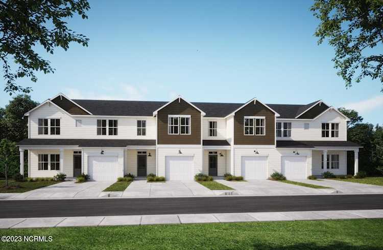 5013 Northstar Leland, NC in Bishops Ridge. The beautiful Mulberry plan, from the popular Hillside Towns Collection, is a charming two-story... Photo 1