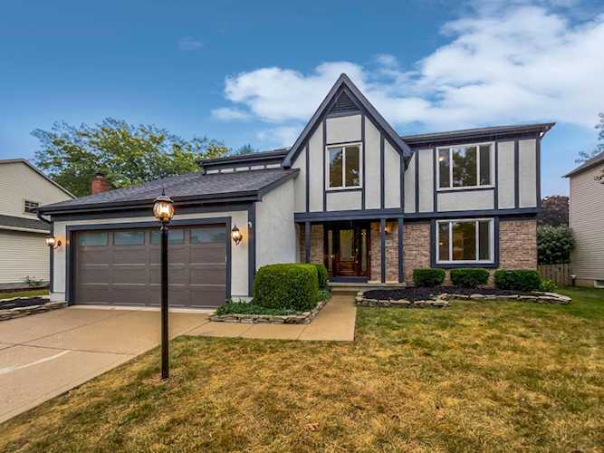For Sale: $422,000 A home for sale for sale at 5749 Whispering Oak Boulevard Hilliard, OH 43026 - Franklin. MLS 223031480 - This beautiful home is perfect for anyone. It features a cozy fireplace, a stunning backsplash in... Photo 1