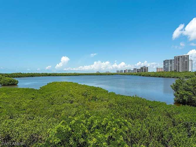 60 Seagate Dr #305 Naples, FL 34103 | MLS 223052404 Photo 1