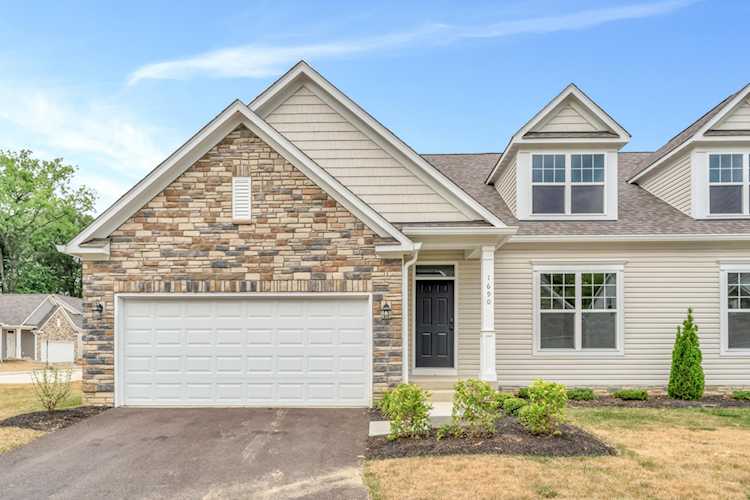 For Sale: $431,945 A condo for sale for sale at 1690 Withers Grove Loop Grove City, OH 43123 - Franklin. MLS 223013441 - This luxury condominium has a spacious 1st floor master suite, open kitchen with walk-in pantry,... Photo 1