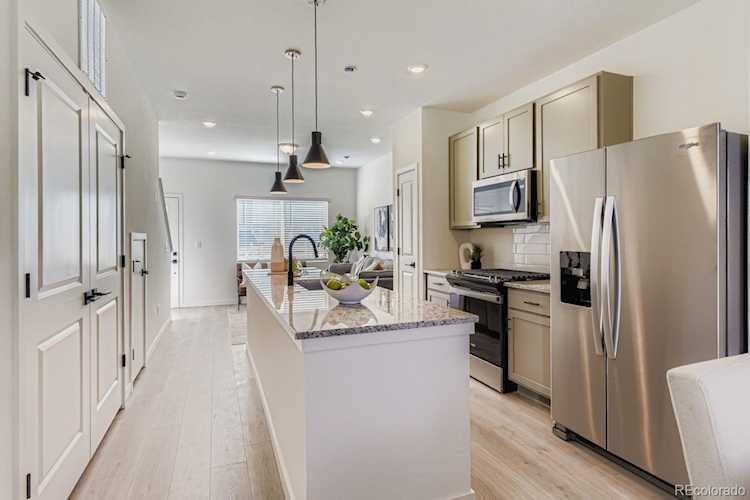 15323 W 69th Ave Geos DECEMBER CLOSEStep into this beautifully designed 2-story townhome featuring 9' ceilings on the... Arvada Jefferson CO 80007 2749280 home for sale $399,990 2749280 Photo 1