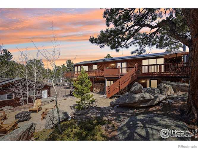 31911 Warrens Rd Coal Creek Rare Colorado Sanctuary. Nestled within over 45 acres of pristine land, this magical forest retreat... Golden Jefferson CO 80403 IR1047855 home for sale $1,158,000 IR1047855 Photo 1